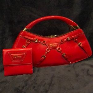 Red Dior clutch and wallet